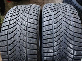 Гуми Зимни 245/45R18, снимка 2 - Гуми и джанти - 38496508