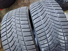 Гуми Зимни 245/45R18, снимка 1 - Гуми и джанти - 38496508