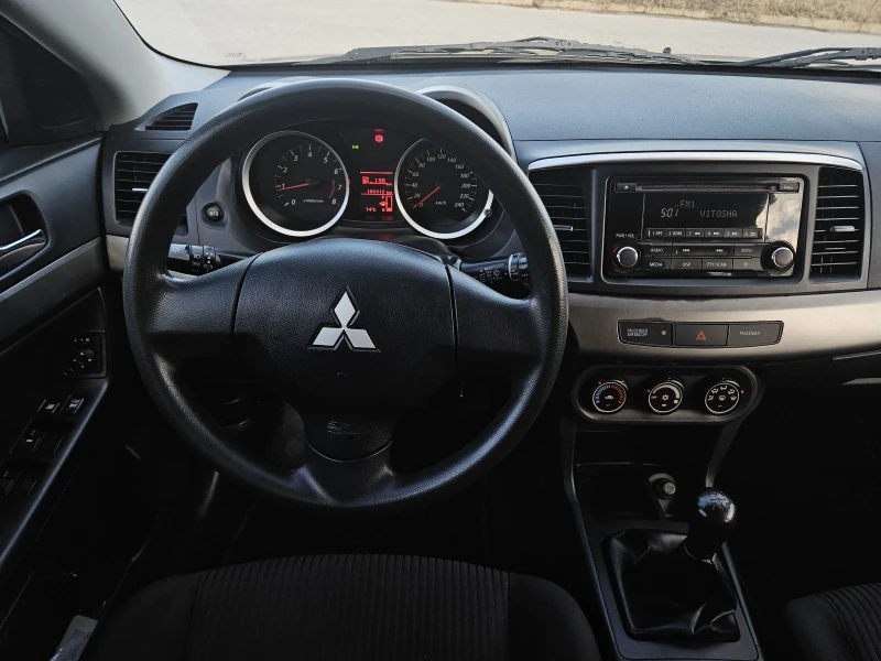 Mitsubishi Lancer 1.6i SWISS EDITION , снимка 11 - Автомобили и джипове - 48296740