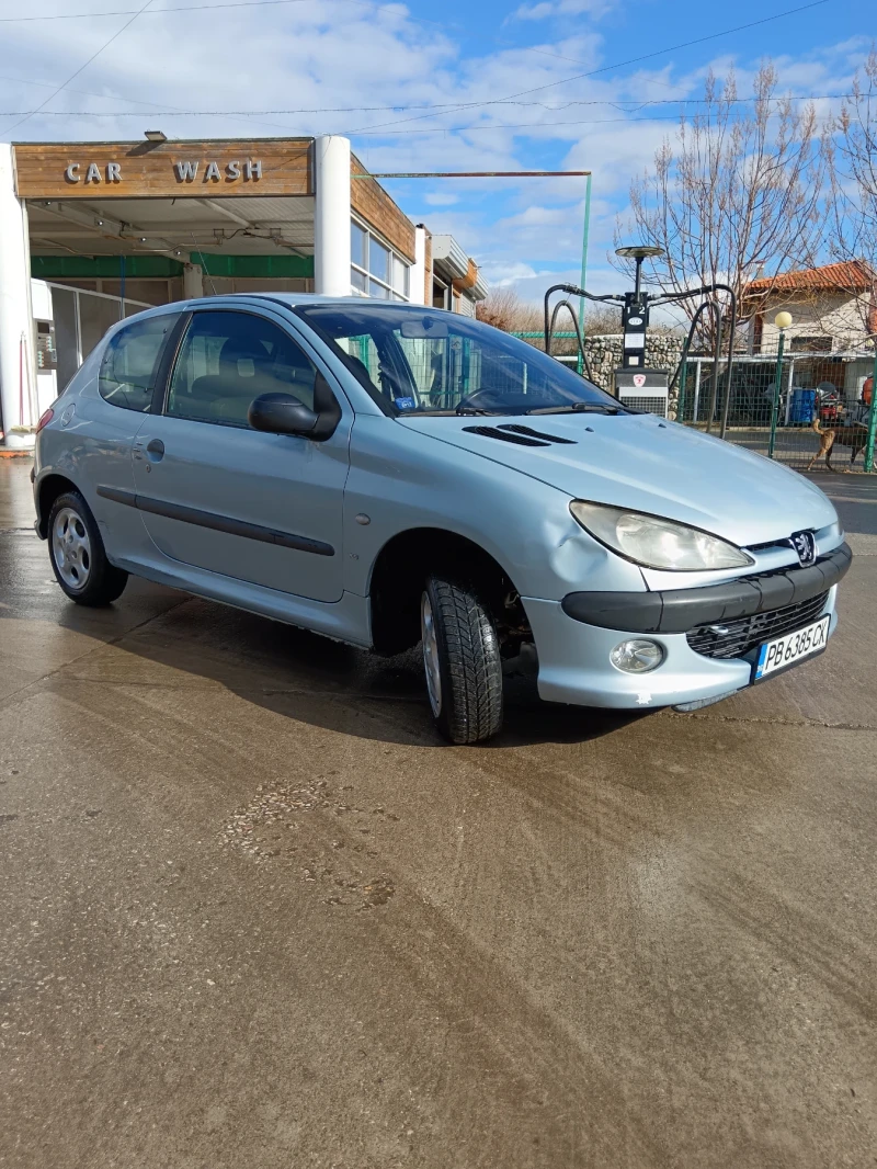 Peugeot 206 1.4i klimatik, снимка 4 - Автомобили и джипове - 53392810