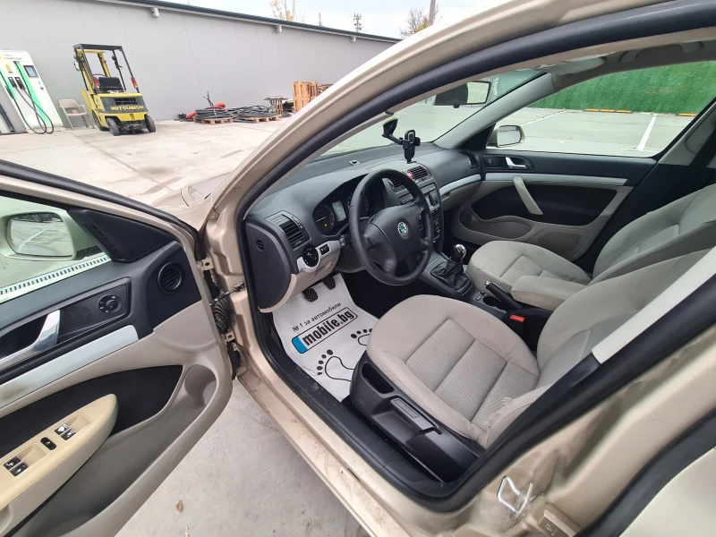 Skoda Octavia 2.0 TDI 140 к.с. ТЕМПОМАТ КЛИМАТРОНИК ЕВРО 4, снимка 11 - Автомобили и джипове - 52576414