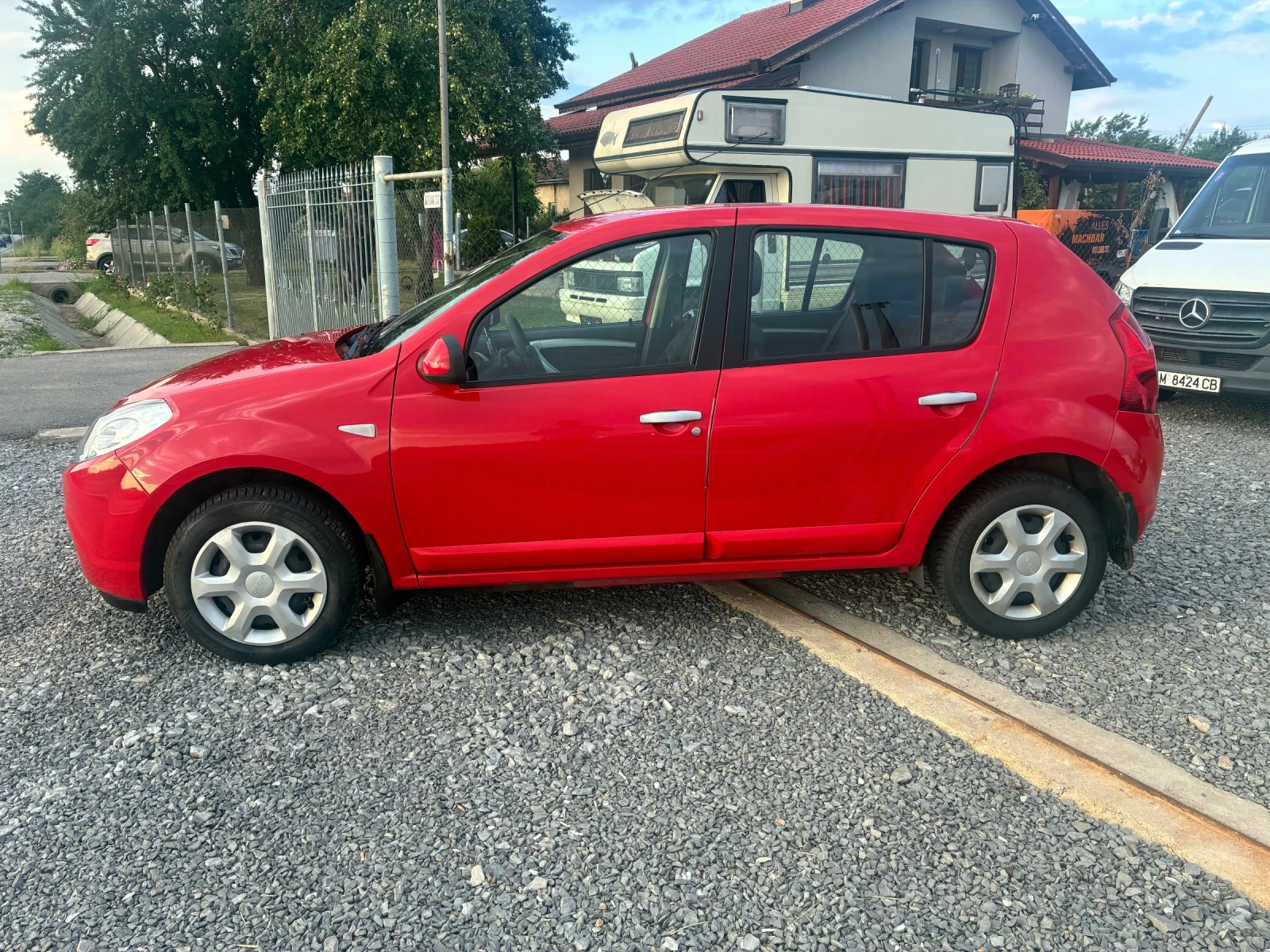 Dacia Sandero 1.2i 16v , снимка 9 - Автомобили и джипове - 55149240