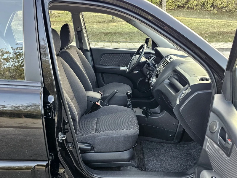 Kia Sportage 2.0 16V Газ/Бензин , снимка 14 - Автомобили и джипове - 52252875