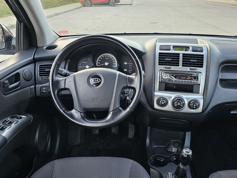 Kia Sportage 2.0 16V Газ/Бензин , снимка 10 - Автомобили и джипове - 52252875
