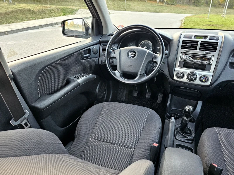 Kia Sportage 2.0 16V Газ/Бензин , снимка 12 - Автомобили и джипове - 52252875