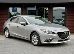 ������ Mazda 3