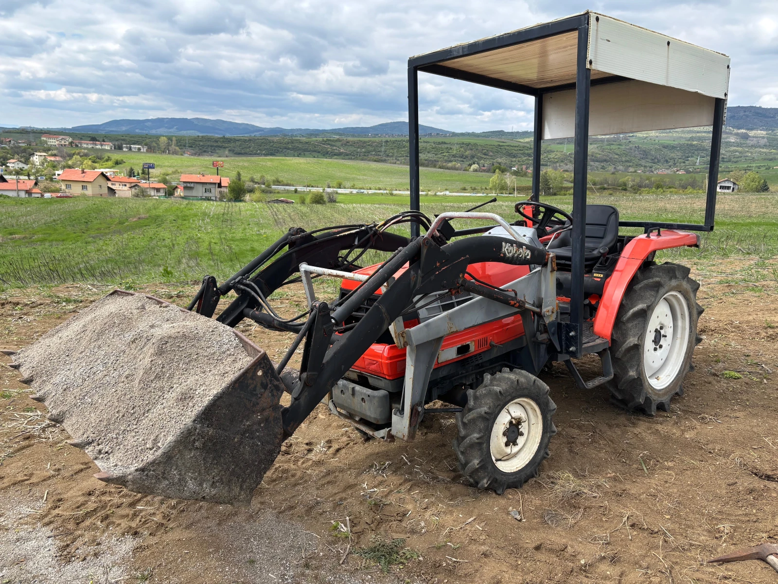 Трактор Kubota