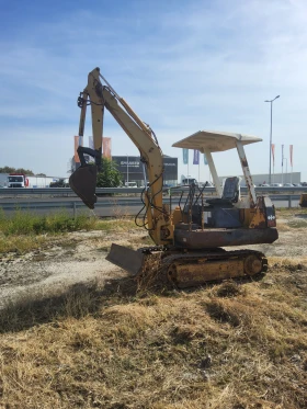 Багер Komatsu PS10-05, снимка 16