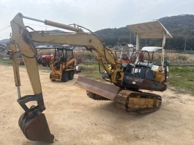 Багер Komatsu PS10-05, снимка 1