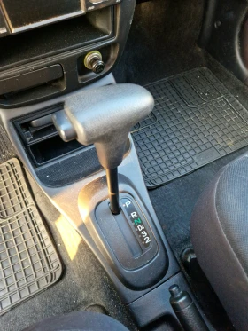 Daihatsu Cuore АВТОМАТИК! 131000км!КЛИМАТИК!, снимка 15