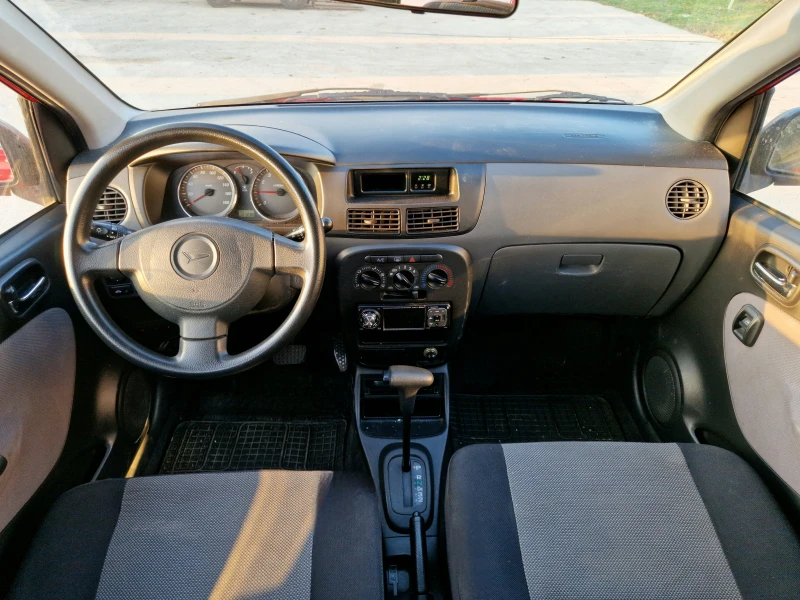 Daihatsu Cuore АВТОМАТИК! 131000км!КЛИМАТИК!, снимка 11 - Автомобили и джипове - 52807064