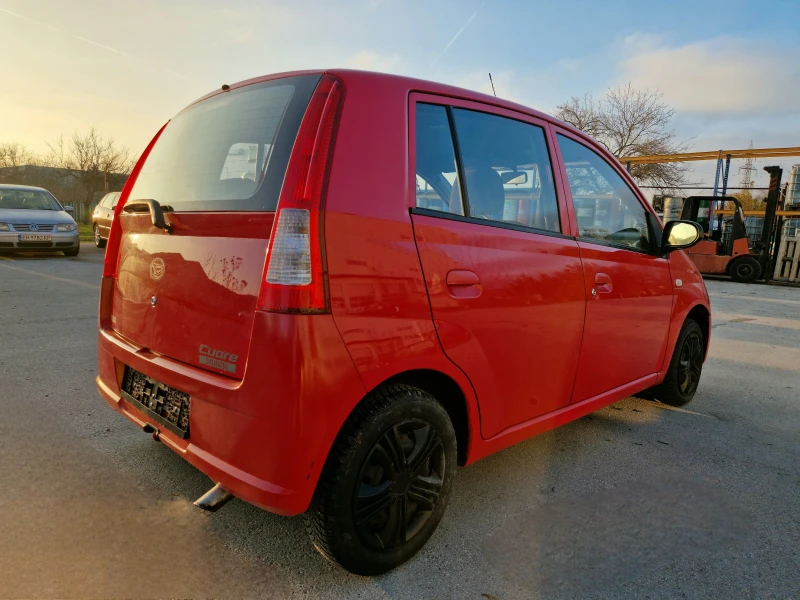 Daihatsu Cuore АВТОМАТИК! 131000км!КЛИМАТИК!, снимка 4 - Автомобили и джипове - 52807064