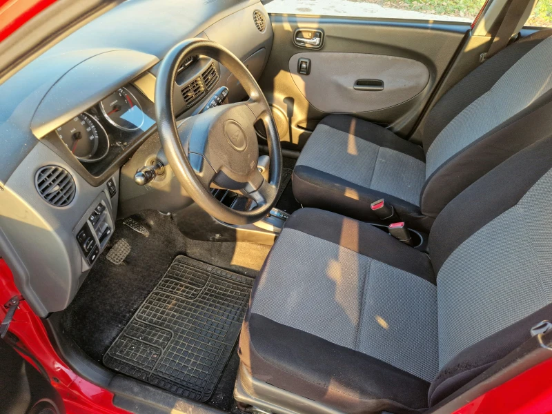 Daihatsu Cuore АВТОМАТИК! 131000км!КЛИМАТИК!, снимка 10 - Автомобили и джипове - 52807064