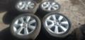 Алуминиеви джанти с гуми  215/55/17 Opel Vectra C 3.0 V6 CDTI, 177 к.с, снимка 1 - Части - 35533136