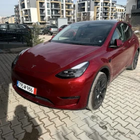 Tesla Model Y 2025 Long Range 12000 км Ultra red - 32800 € / 64151.22 лв. - 37847944 2