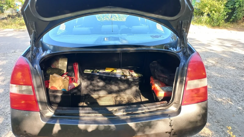 Nissan Primera P12, снимка 9 - Автомобили и джипове - 51545575