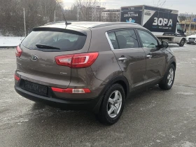 Kia Sportage 2.0crdi--4x4--automat - 9221 € / 18034.71 лв. - 84529044 4