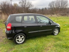 Honda Jazz 1, 4 Автоматик 8 бр гуми с джанти Швейцария!!!, снимка 7