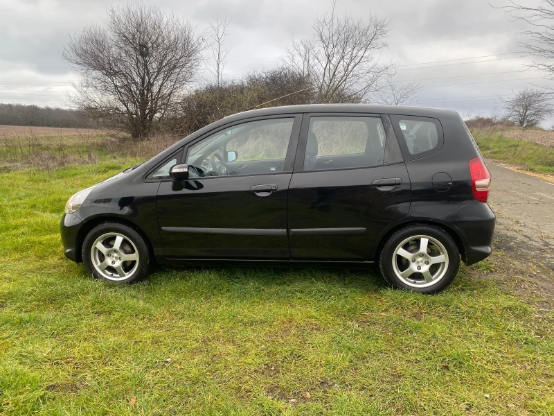 Honda Jazz 1, 4 Автоматик 8 бр гуми с джанти Швейцария!!!, снимка 8 - Автомобили и джипове - 52875377
