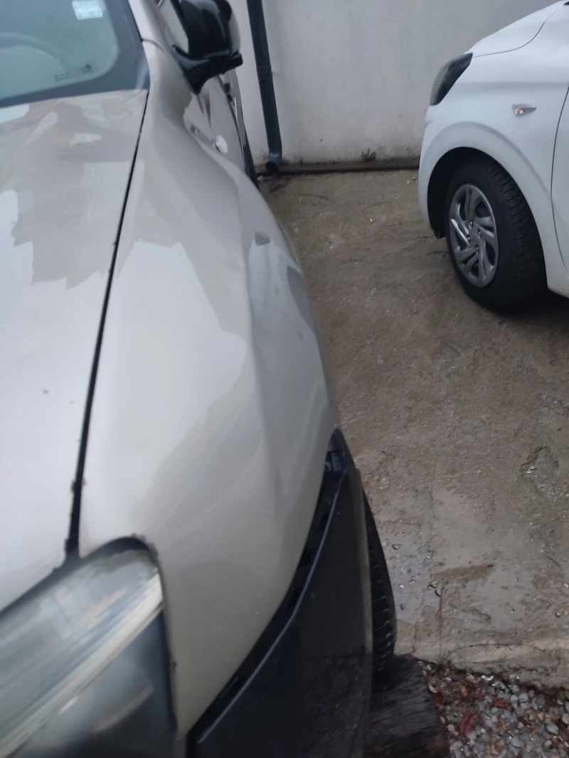 Dacia Duster 1.6-SWISS, снимка 11 - Автомобили и джипове - 53427654