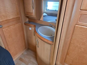 Каравана Adria Hobby Френска спалня, снимка 17