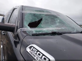 Dodge RAM 1500 Longhorn 4x4 Crew Cab 5'7" Box - 14500 € / 28359.53 лв. - 18054093 12