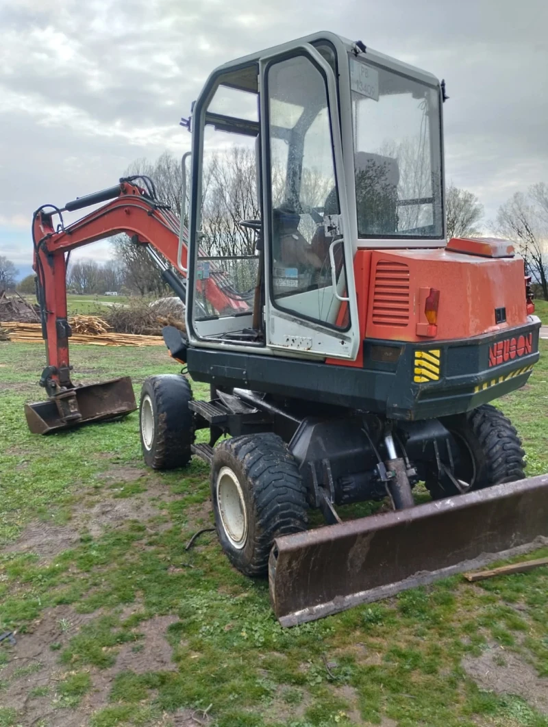 Багер Neuson 3800WD