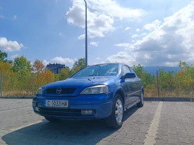     Opel Astra G ()