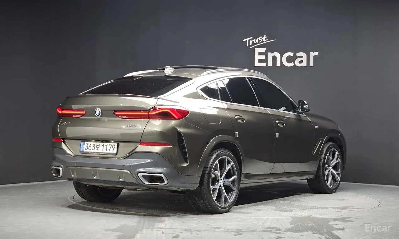 BMW X6 xDrive40i M Sport/ДИСТР/ОБДУХ/ХЕДЪП/ЛАЗЕРИ/МАСАЖ, снимка 2 - Автомобили и джипове - 56005323