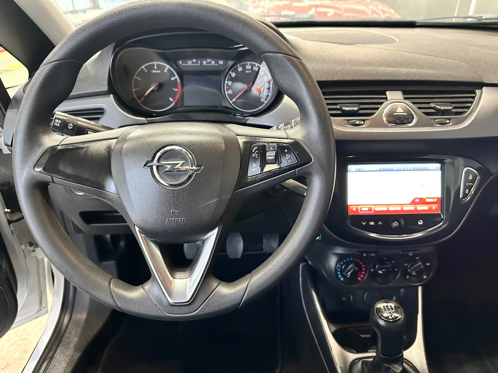 Opel Corsa 1.2i-70к.с, снимка 16 - Автомобили и джипове - 56697352