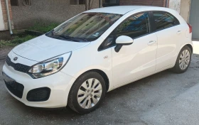 ������ Kia Rio