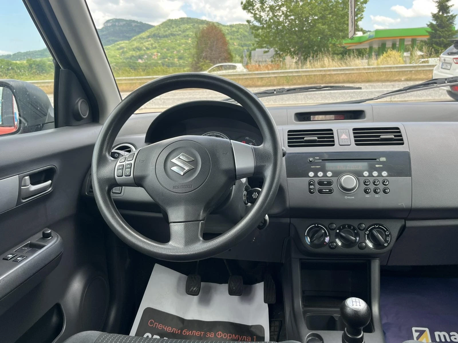 Suzuki Swift 1.3I 92кс КЛИМАТИК EURO 4 , снимка 12 - Автомобили и джипове - 54794513