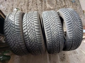 Гуми Зимни 215/60R17, снимка 1 - Гуми и джанти - 41209286