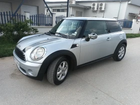     Mini Cooper 1.4 95 .