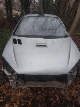 ������ Peugeot 206