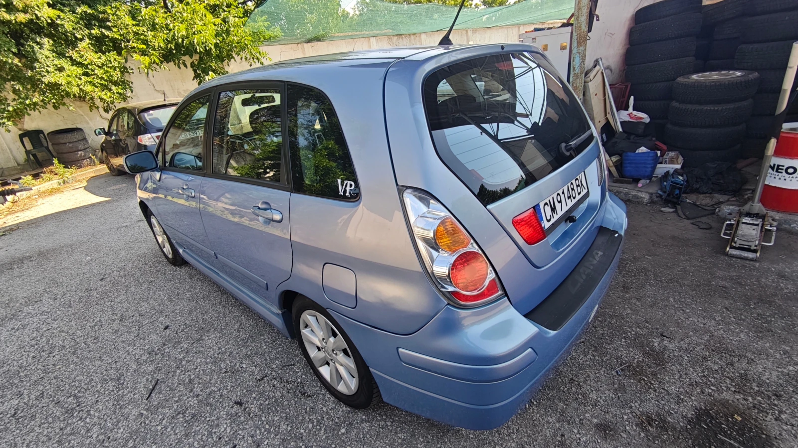 Suzuki Liana, снимка 4 - Автомобили и джипове - 55313889