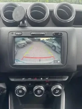 Dacia Duster 1.6i LPG 114hp* КОЖА* ПОДГРЕВ* TV+ DVD* LED* NAVI*, снимка 15 - Автомобили и джипове - 55704696