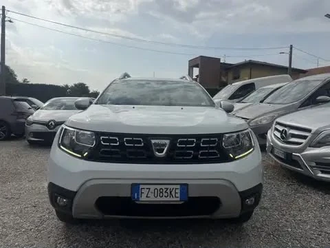 Dacia Duster 1.6i LPG 114hp* КОЖА* ПОДГРЕВ* TV+ DVD* LED* NAVI*, снимка 2 - Автомобили и джипове - 55704696