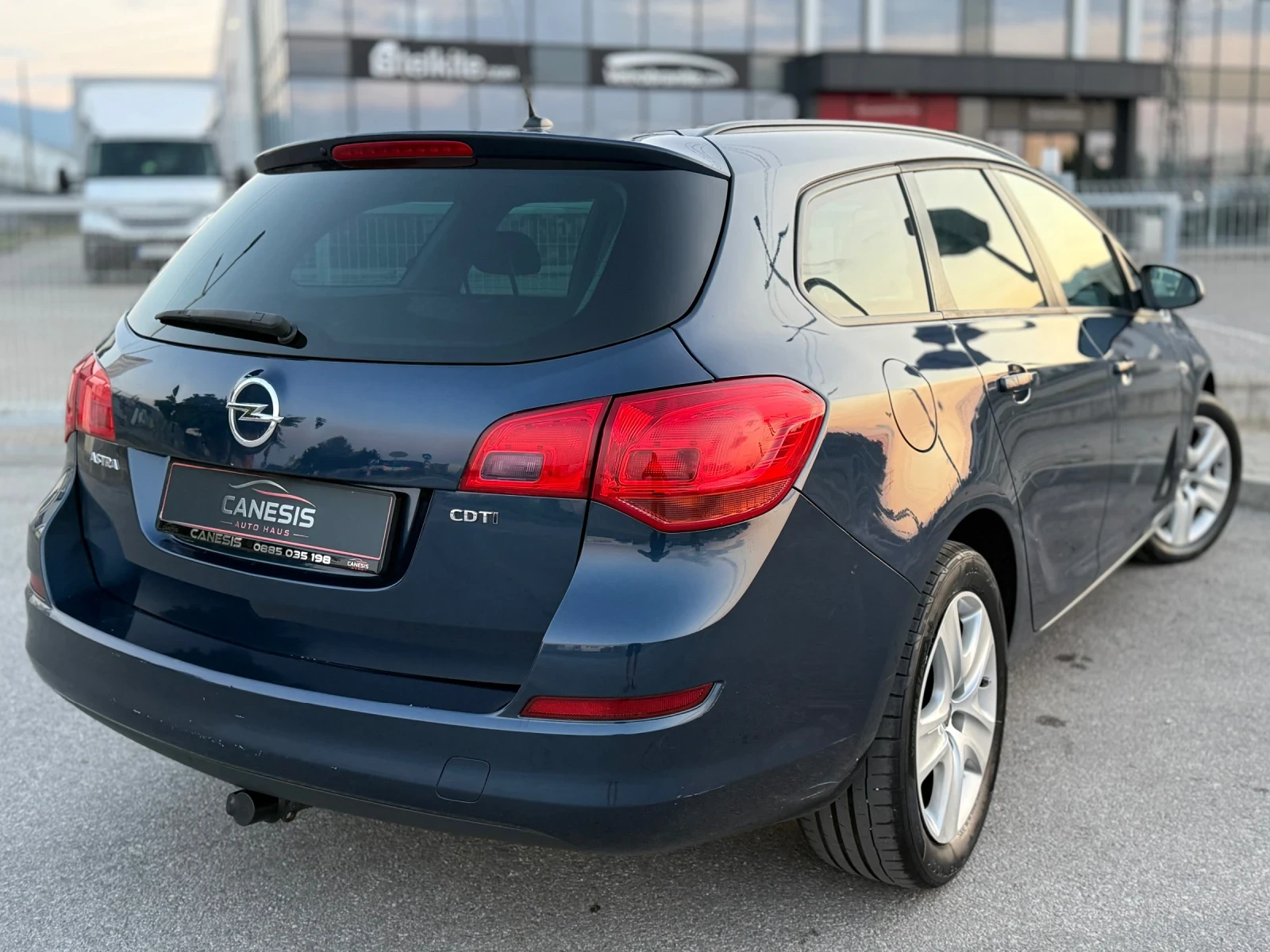 Opel Astra 1.7CDTi* 110КС* 6-СКОРОСТИ* Srorts Tourer* COSMO, снимка 4 - Автомобили и джипове - 55436848