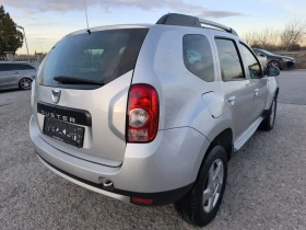 Dacia Duster 1.6 ГАЗ 160х км СЕВРИЗНА КНИЖКА , снимка 4