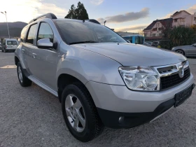 Dacia Duster 1.6 ГАЗ 160х км СЕВРИЗНА КНИЖКА , снимка 3