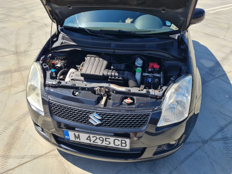 Suzuki Swift 1.3i 4x4 103 000 км, снимка 9 - Автомобили и джипове - 47457189