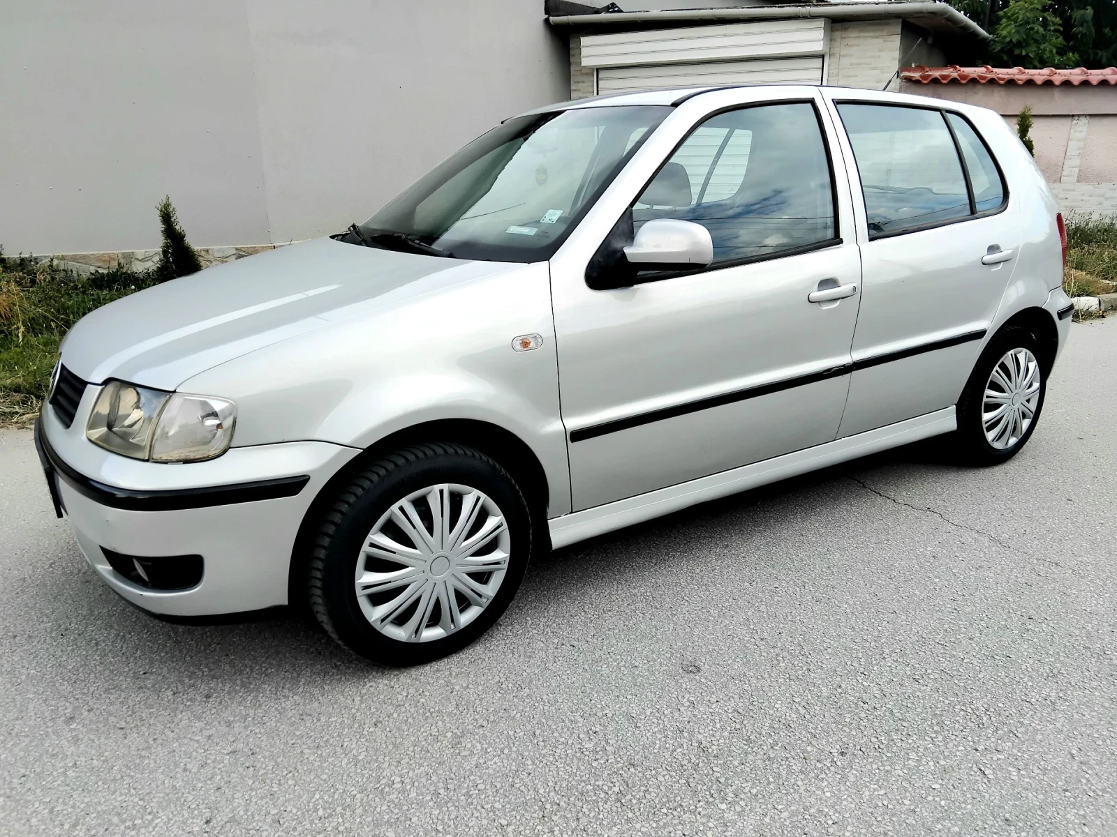 VW Polo 1.4i.75k + КЛИМА. БЕНЗИН. , снимка 8 - Автомобили и джипове - 55187788