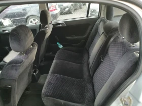 Opel Astra 1.4i КЛИМА 90кс, снимка 11