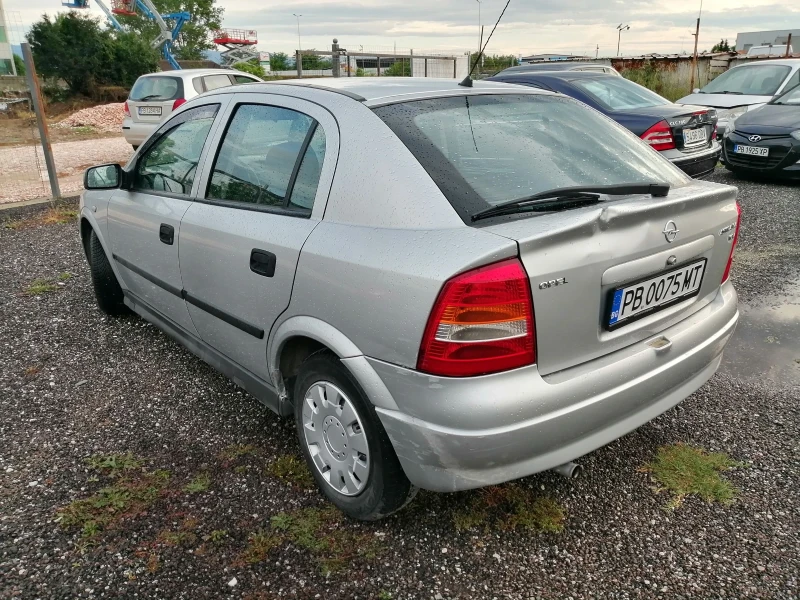 Opel Astra 1.4i КЛИМА 90кс, снимка 7 - Автомобили и джипове - 49795000