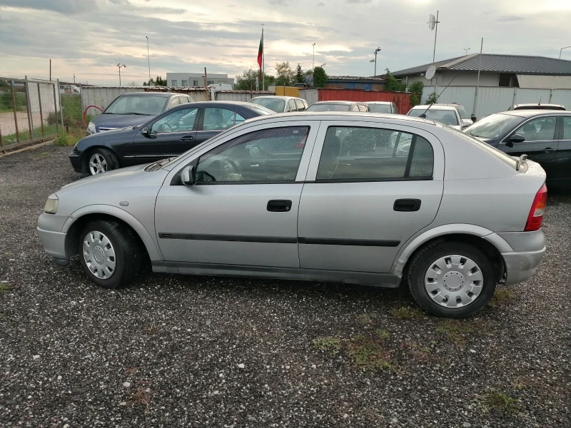 Opel Astra 1.4i КЛИМА 90кс, снимка 8 - Автомобили и джипове - 49795000