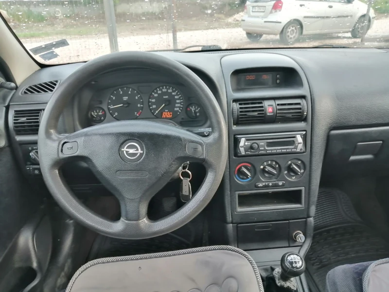 Opel Astra 1.4i КЛИМА 90кс, снимка 10 - Автомобили и джипове - 49795000