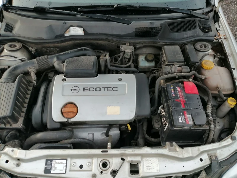 Opel Astra 1.4i КЛИМА 90кс, снимка 14 - Автомобили и джипове - 49795000