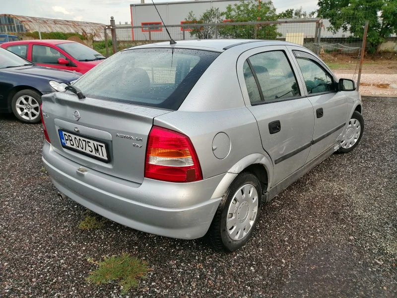Opel Astra 1.4i КЛИМА 90кс, снимка 5 - Автомобили и джипове - 49795000