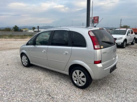     Opel Meriva 1.7* * 